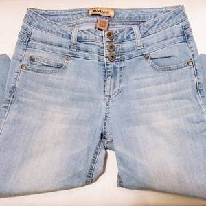 Button down distressed skinny denim jeans